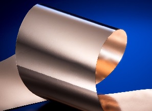 Clad metals for heat spreaders